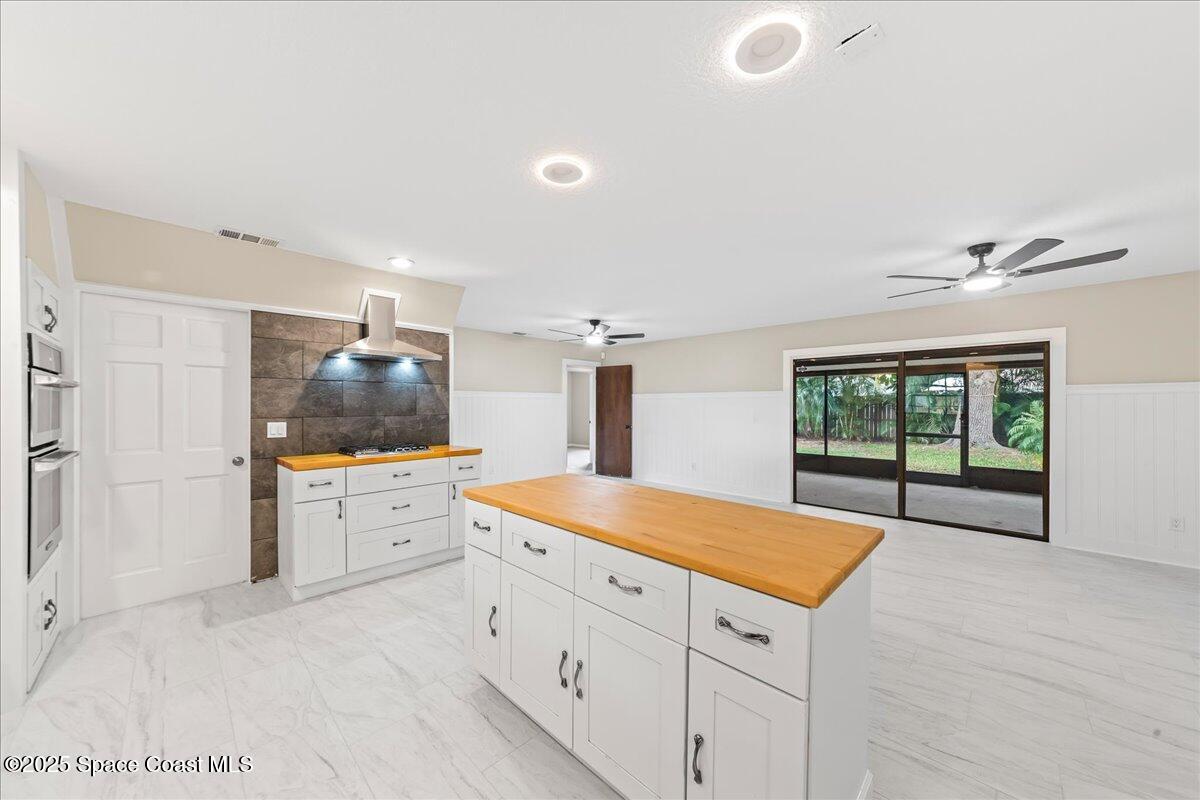 2010 Talloak Road Melbourne, FL 32935 - Photo 3 of 45 a kitchen with sink and cabinets