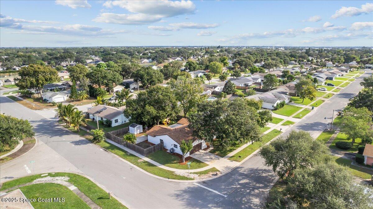 2010 Talloak Road Melbourne, FL 32935 - Photo 34 of 45 an aerial view of residential houses with outdoor space