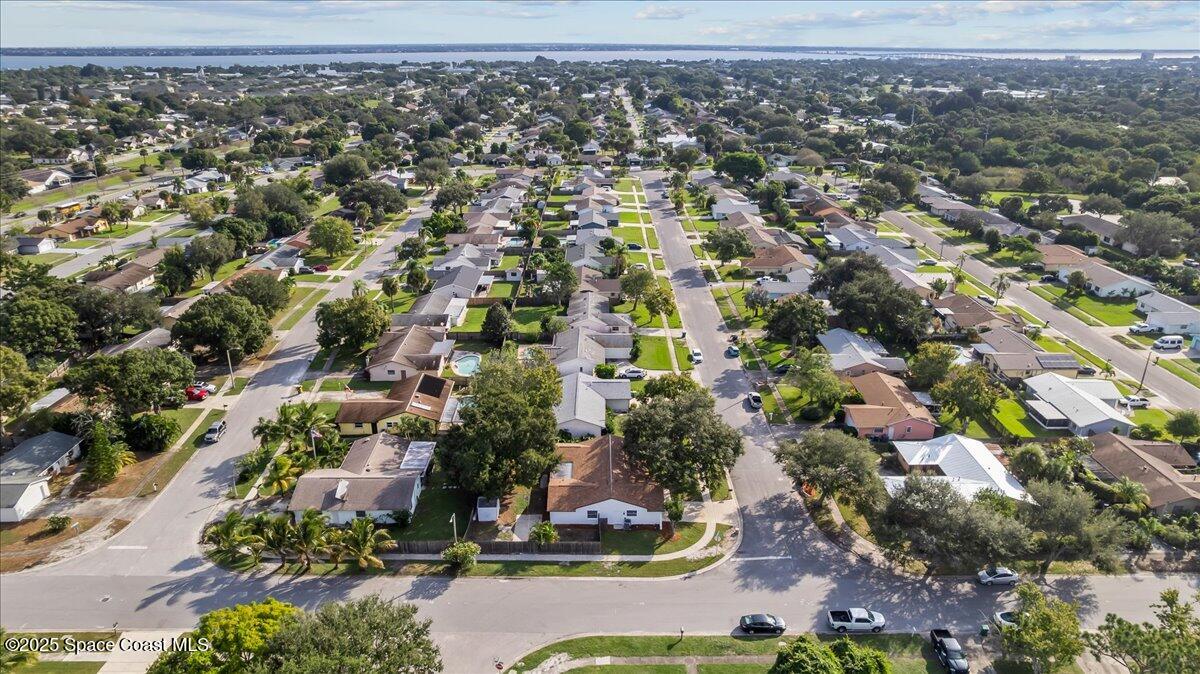 2010 Talloak Road Melbourne, FL 32935 - Photo 38 of 45 an aerial view of residential houses with outdoor space