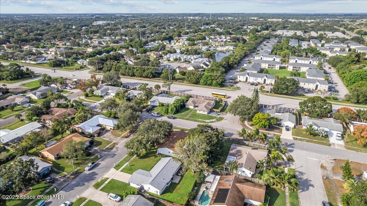2010 Talloak Road Melbourne, FL 32935 - Photo 41 of 45 an aerial view of residential houses with outdoor space