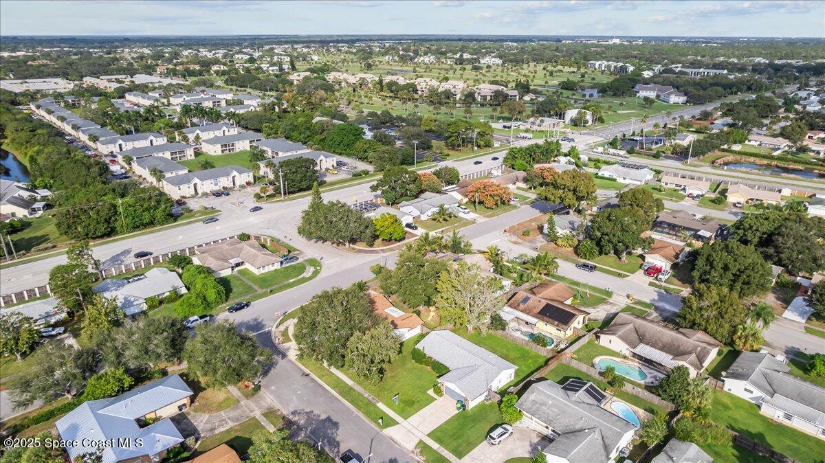 2010 Talloak Road Melbourne, FL 32935 - Photo 43 of 45 an aerial view of residential houses with outdoor space