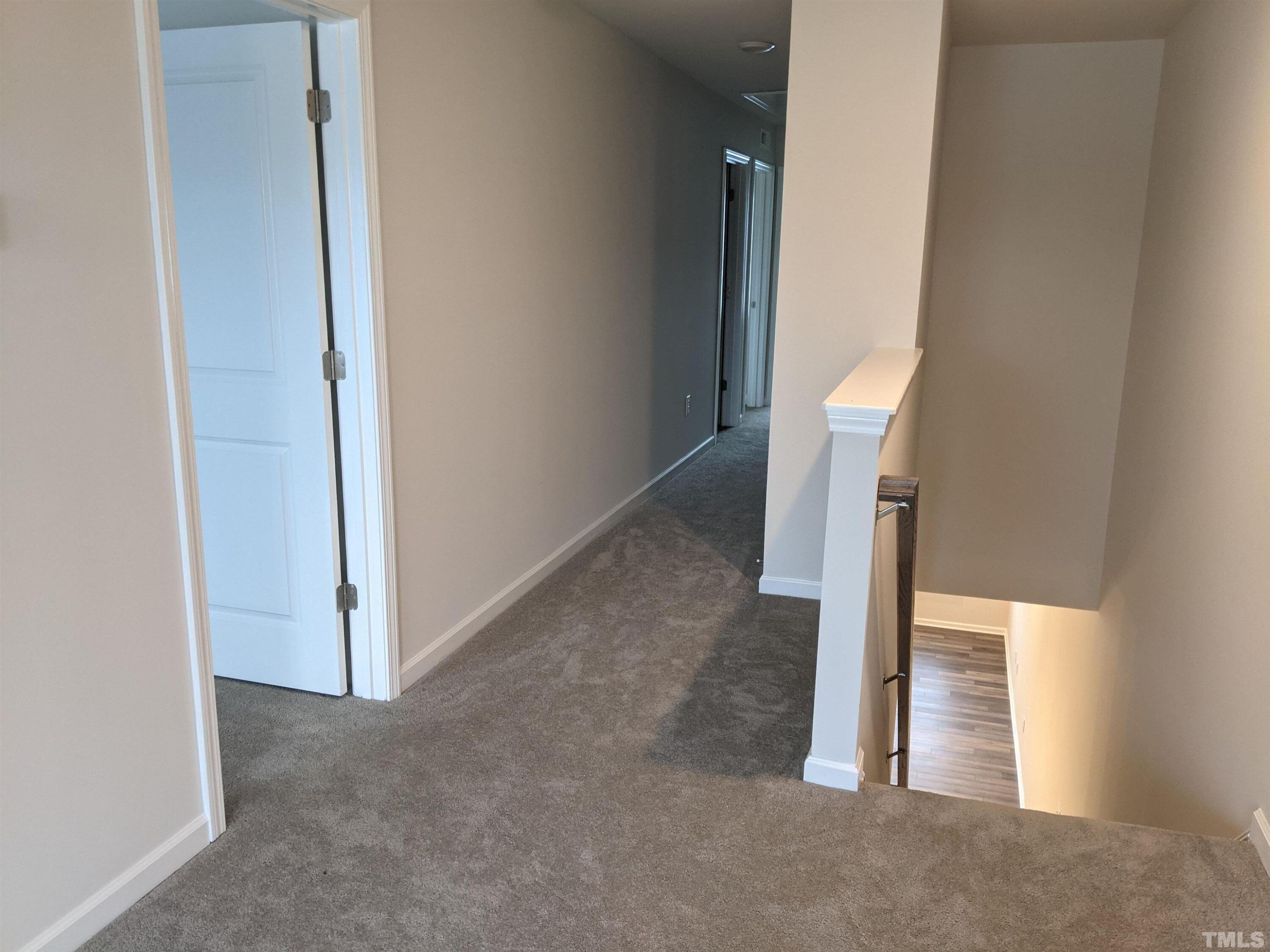 912 Robbie Jackson Lane Fuquay-Varina, NC 27526 - Photo 6 of 10 a view of a hallway with staircase