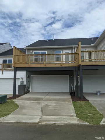 a front view of building with yard