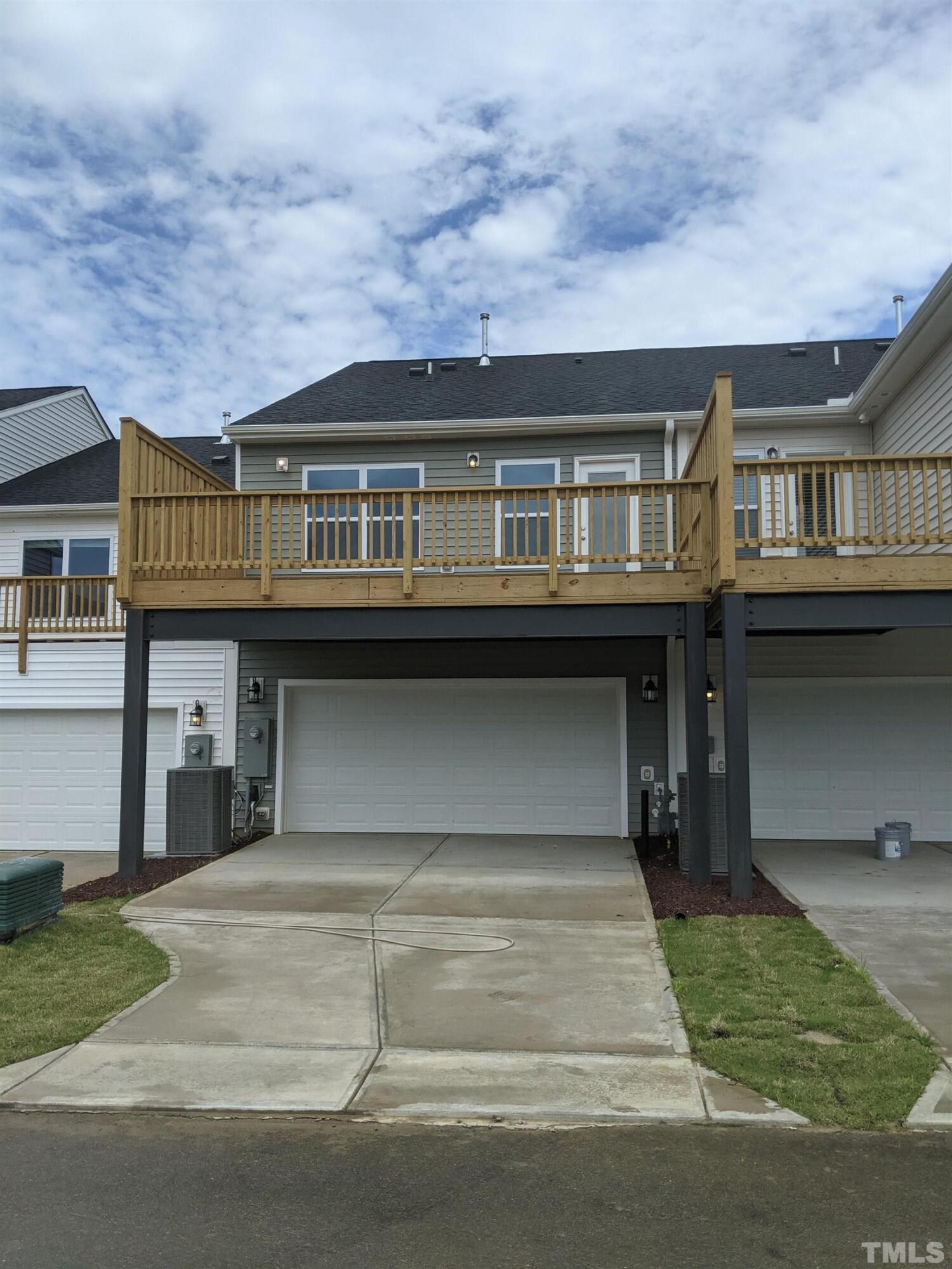912 Robbie Jackson Lane Fuquay-Varina, NC 27526 - Photo 8 of 10 a front view of building with yard