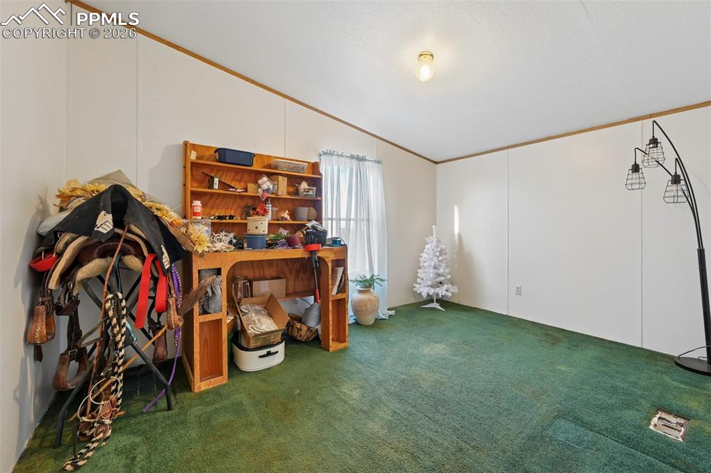 35875 Shear Road Yoder, CO 80864 - Photo 25 of 45 a view of an empty room with gym equipment
