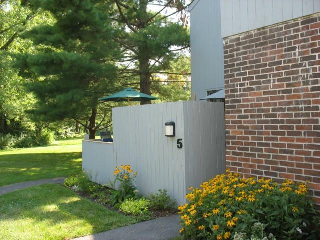 5 Honeysuckle Lane, Unit 5 Ridgefield, CT 06877 - Photo 1 of 1 a view of a backyard