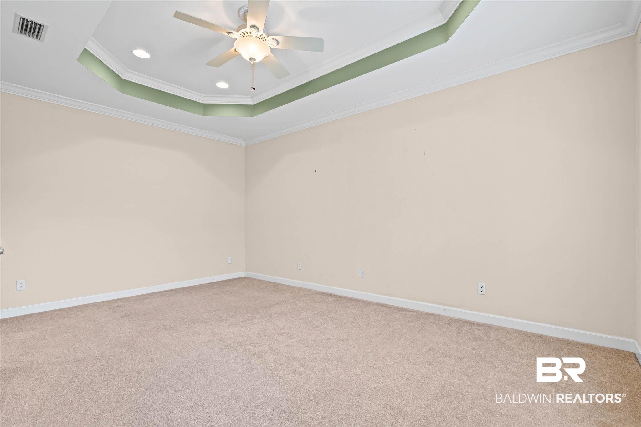 1003 Weatherby Street South Saraland, AL 36571 - Photo 23 of 31 Empty room with a ceiling fan, light carpet, ornamental molding, a raised ceiling, and recessed lighting