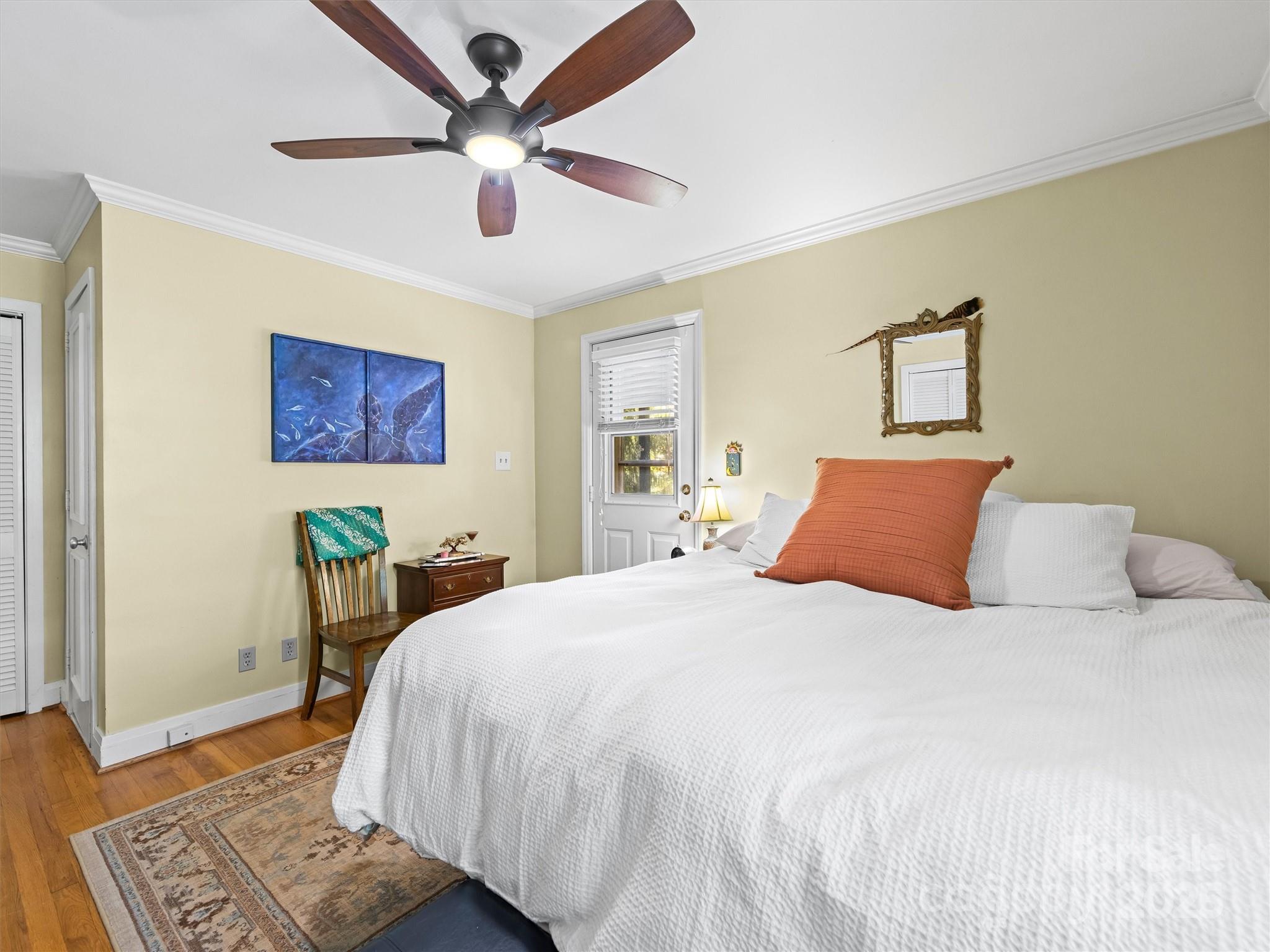 9 Hilltop Road Asheville, NC 28803 - Photo 19 of 34 a bedroom with a large bed and a window