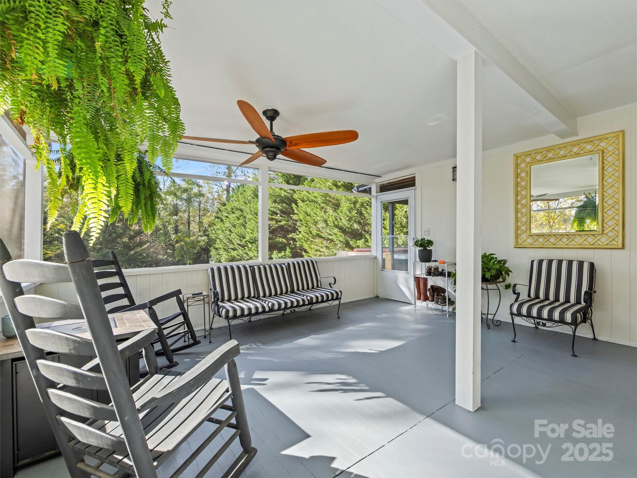 9 Hilltop Road Asheville, NC 28803 - Photo 24 of 34 a view of living room and balcony with wooden floor