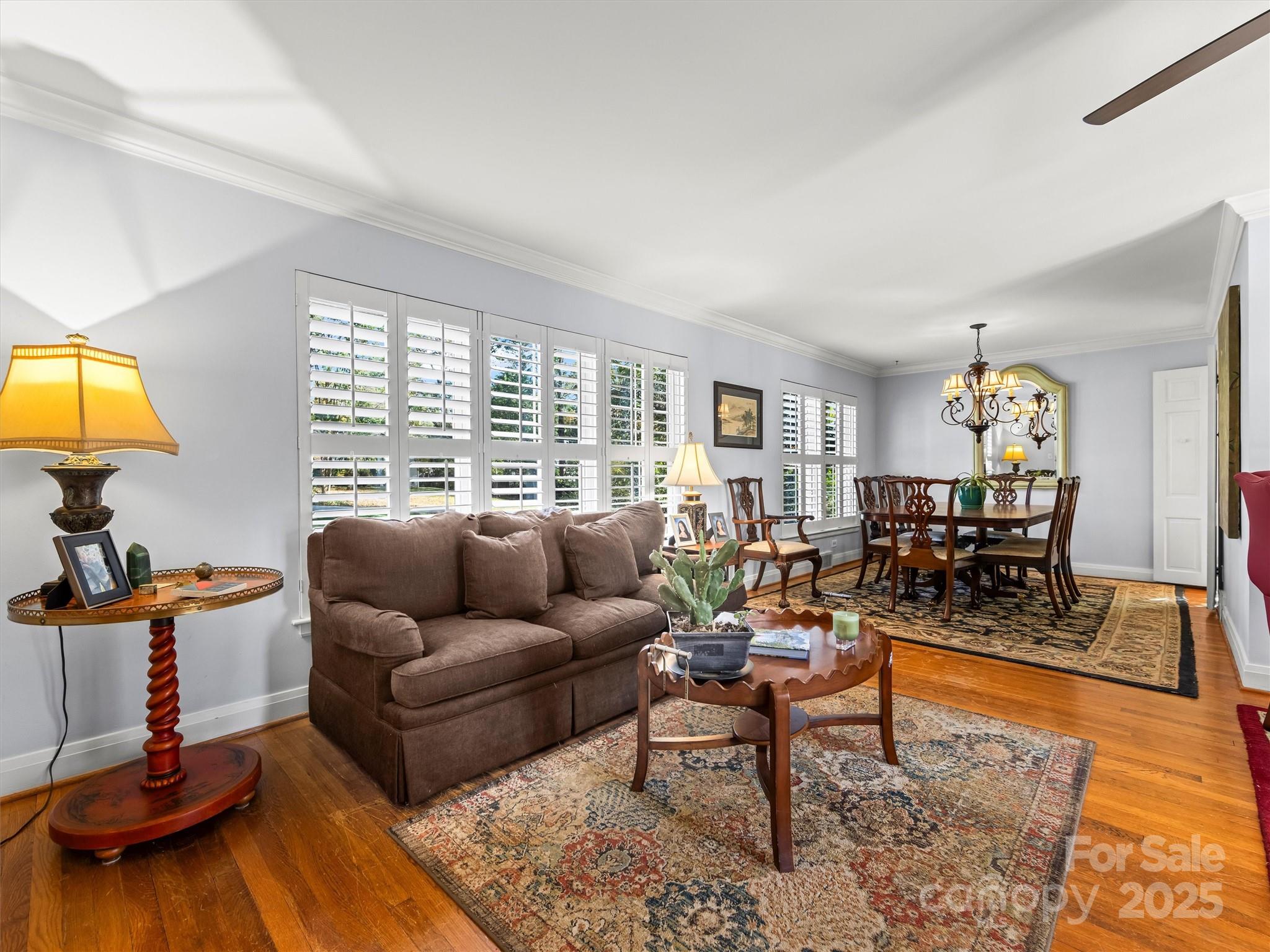 9 Hilltop Road Asheville, NC 28803 - Photo 6 of 34 a living room with furniture and a flat screen tv