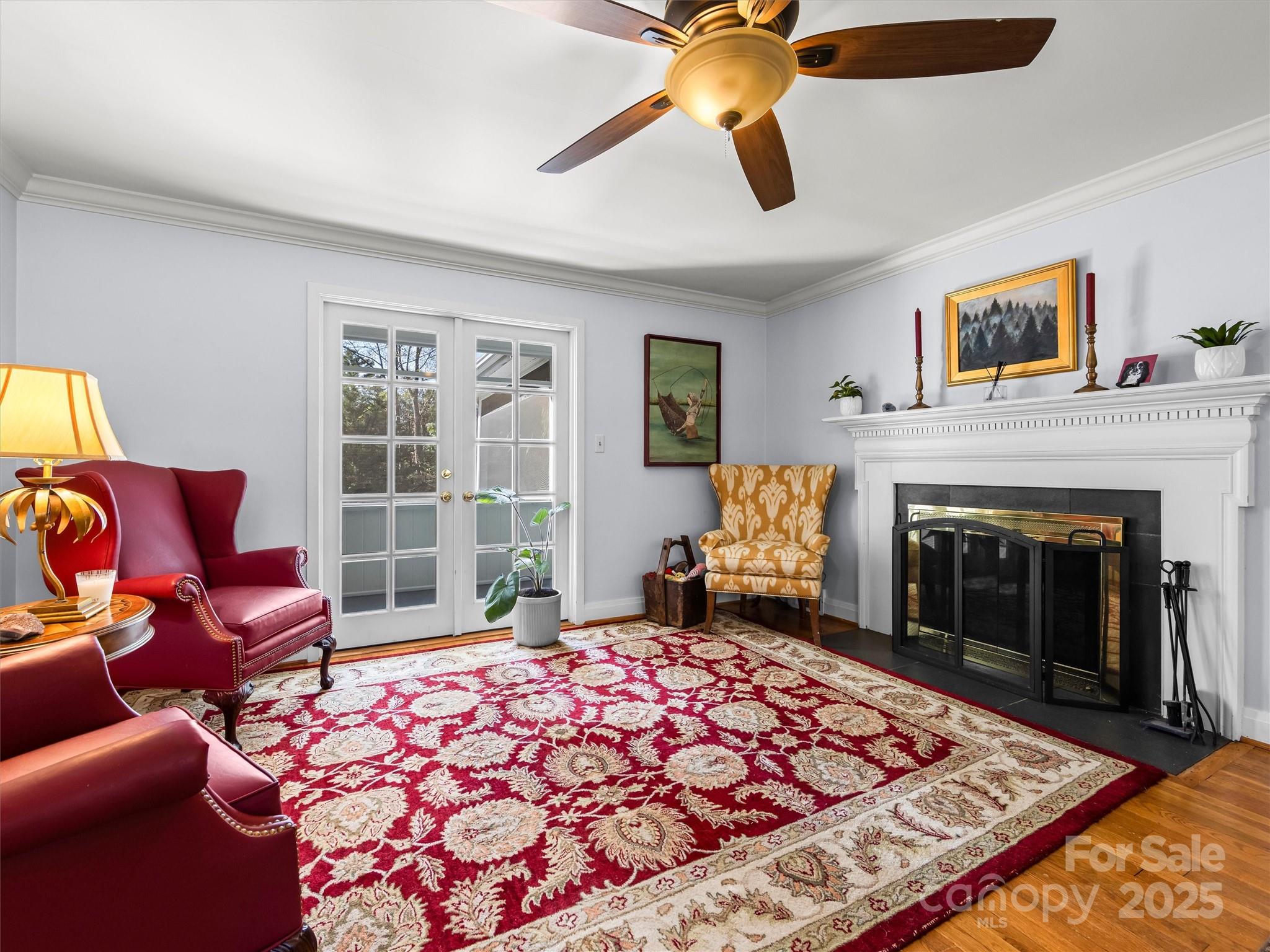 9 Hilltop Road Asheville, NC 28803 - Photo 8 of 34 a living room with a couch and a fireplace