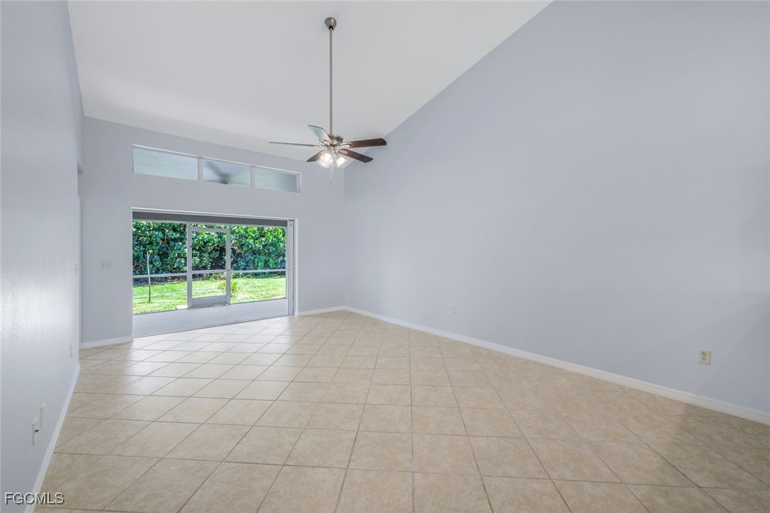 5781-5783 Marina Road Bokeelia, FL 33922 - Photo 16 of 48 a view of a livingroom with a ceiling fan and window