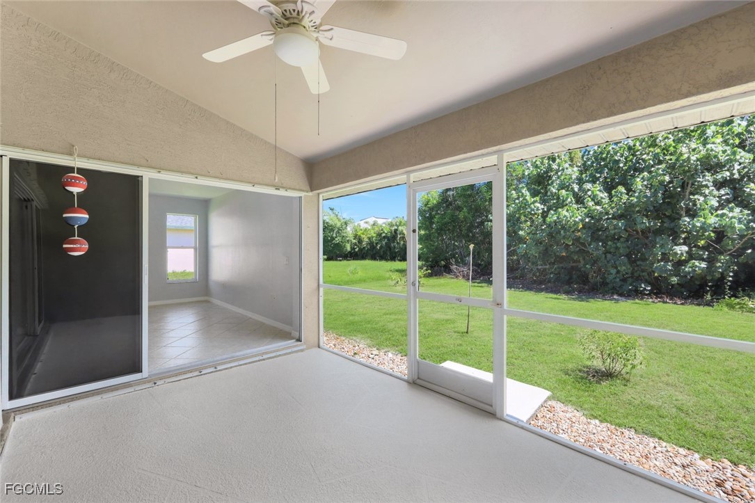 5781-5783 Marina Road Bokeelia, FL 33922 - Photo 22 of 48 a view of a porch with a yard