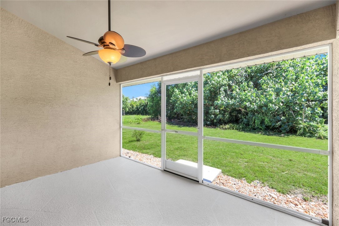 5781-5783 Marina Road Bokeelia, FL 33922 - Photo 42 of 48 a view of a room with a big yard