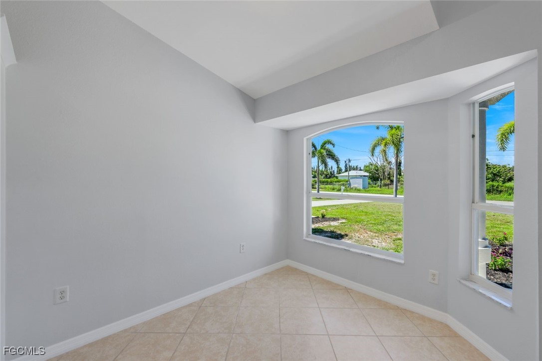5781-5783 Marina Road Bokeelia, FL 33922 - Photo 8 of 48 a view of an empty room with window