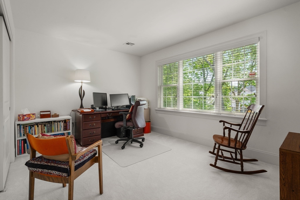 287 Langley Road, Unit 43 Newton, MA 02459 - Photo 20 of 36 a workspace with furniture and a window
