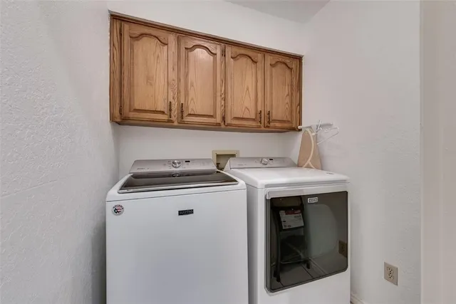 a bathroom with a tub and shower