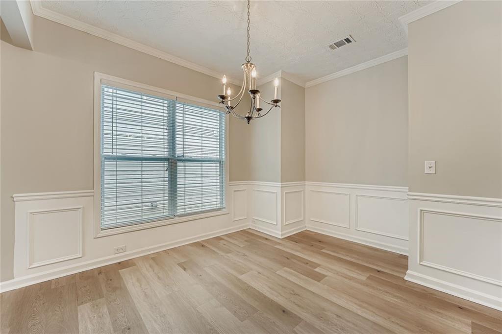 104 Oleander Way Canton, GA 30114 - Photo 9 of 28 a view of an empty room with a window