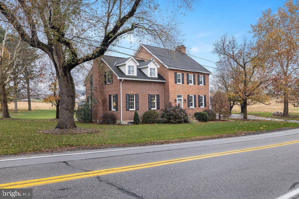 503 Main Street York Springs, PA 17372 - Photo 12 of 62 a front view of a house with a yard and an trees
