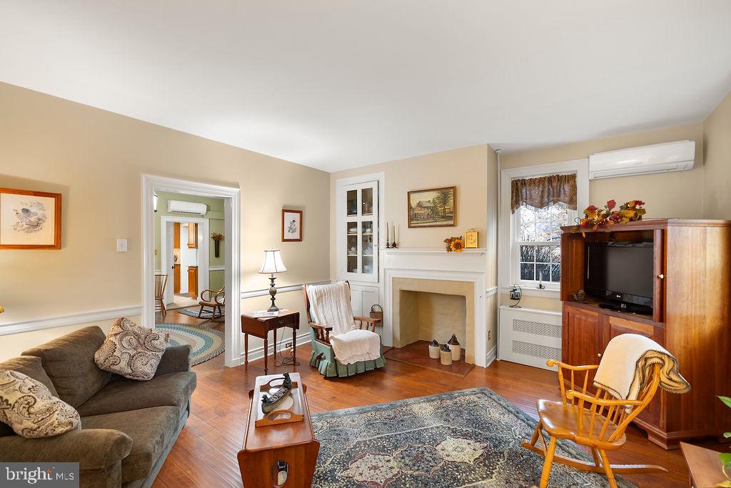 503 Main Street York Springs, PA 17372 - Photo 16 of 62 a living room with furniture and a fireplace