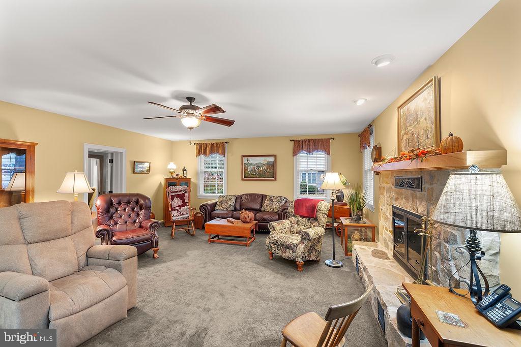 503 Main Street York Springs, PA 17372 - Photo 23 of 62 a living room with fireplace furniture and a wooden floor