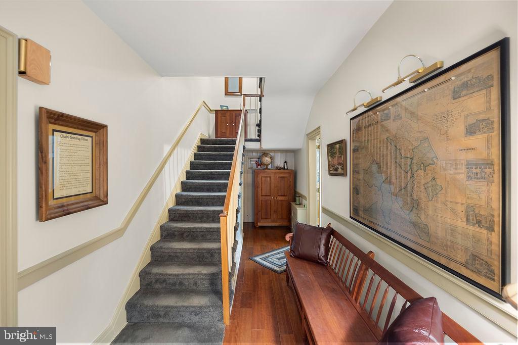 503 Main Street York Springs, PA 17372 - Photo 34 of 62 a view of staircase with lots of frames on wall and a window