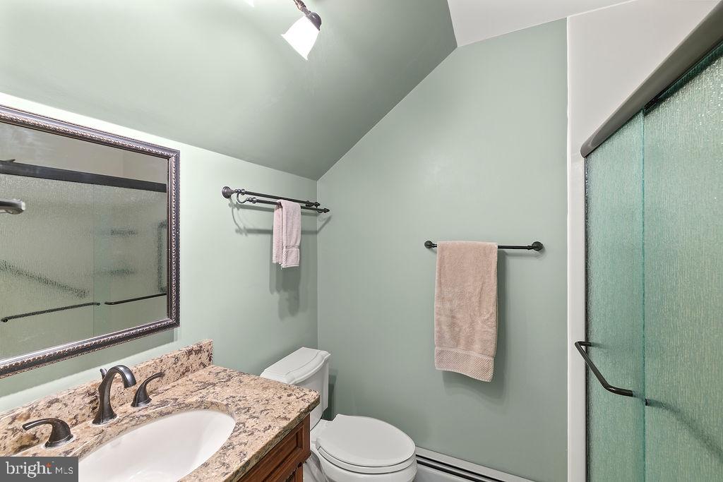 503 Main Street York Springs, PA 17372 - Photo 38 of 62 a bathroom with a granite countertop sink toilet and shower