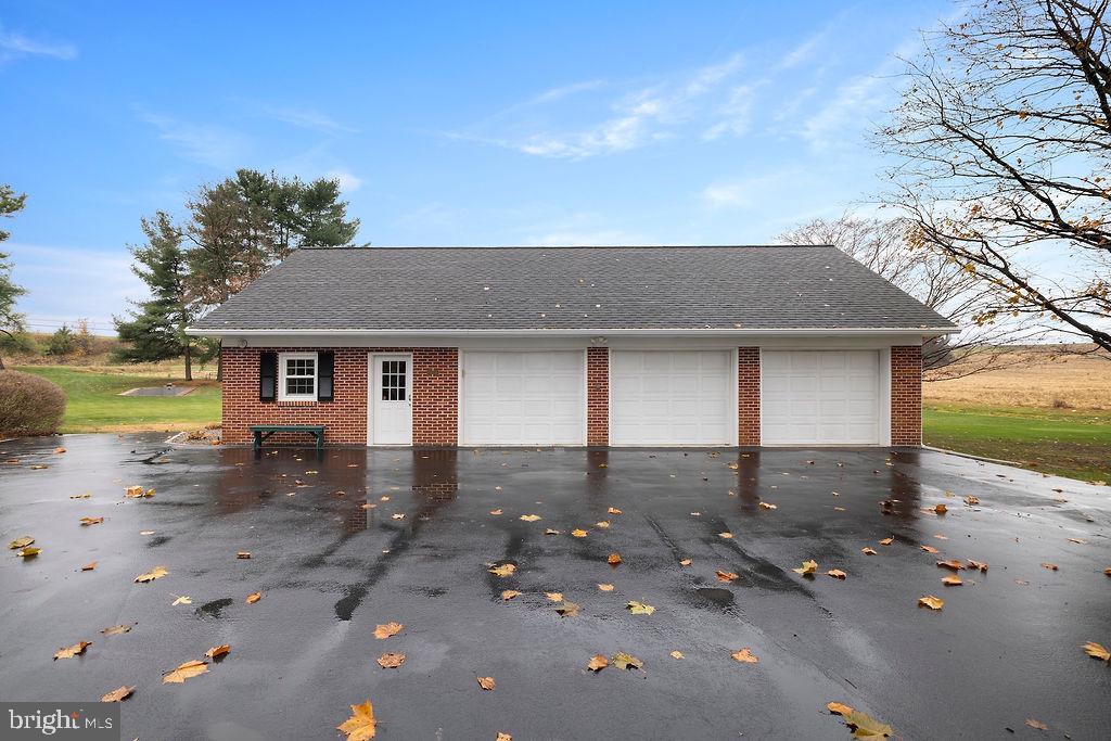 503 Main Street York Springs, PA 17372 - Photo 51 of 62 a front view of a house with a yard and garage