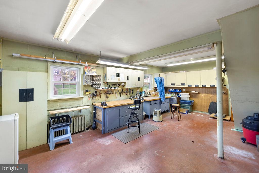 503 Main Street York Springs, PA 17372 - Photo 52 of 62 a room with lots of wooden furniture and a large window