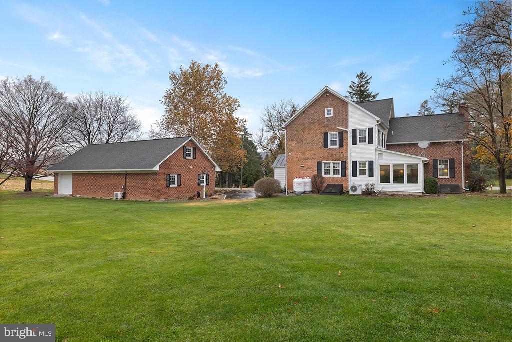 503 Main Street York Springs, PA 17372 - Photo 8 of 62 a front view of a house with a garden