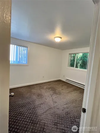 en empty room with windows