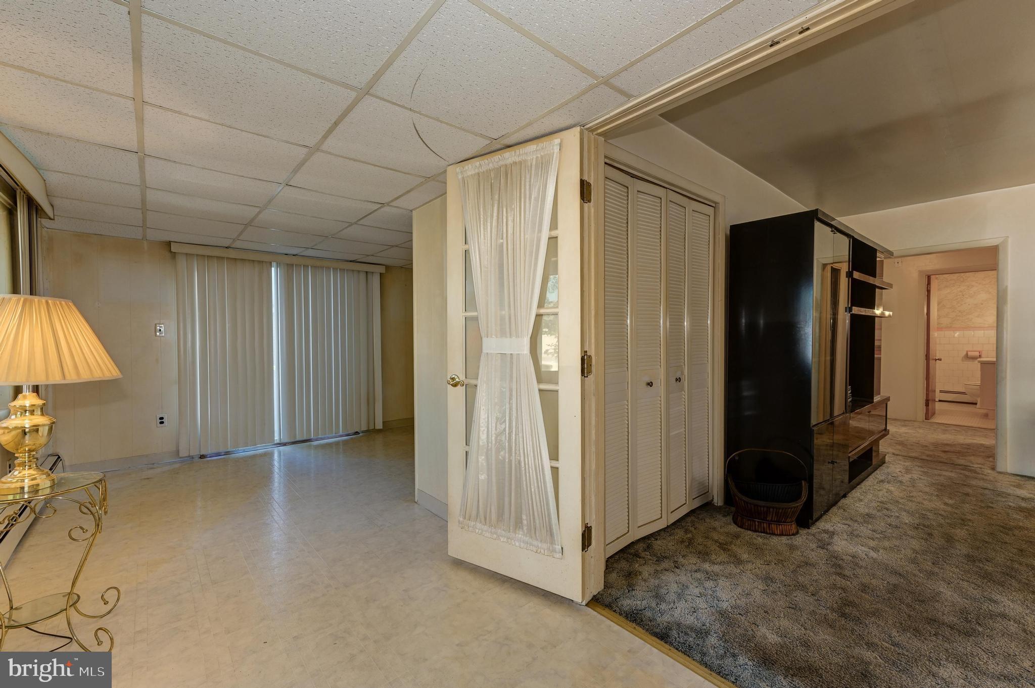 402 Line Street Hammonton, NJ 08037 - Photo 3 of 24 Sunroom/ den accessing living room