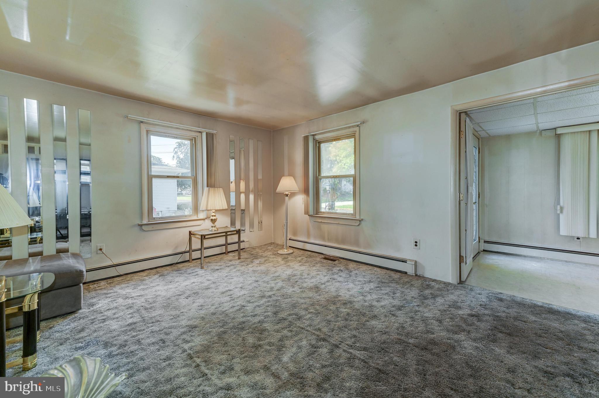 402 Line Street Hammonton, NJ 08037 - Photo 7 of 24 Living room off sunroom and dinning room