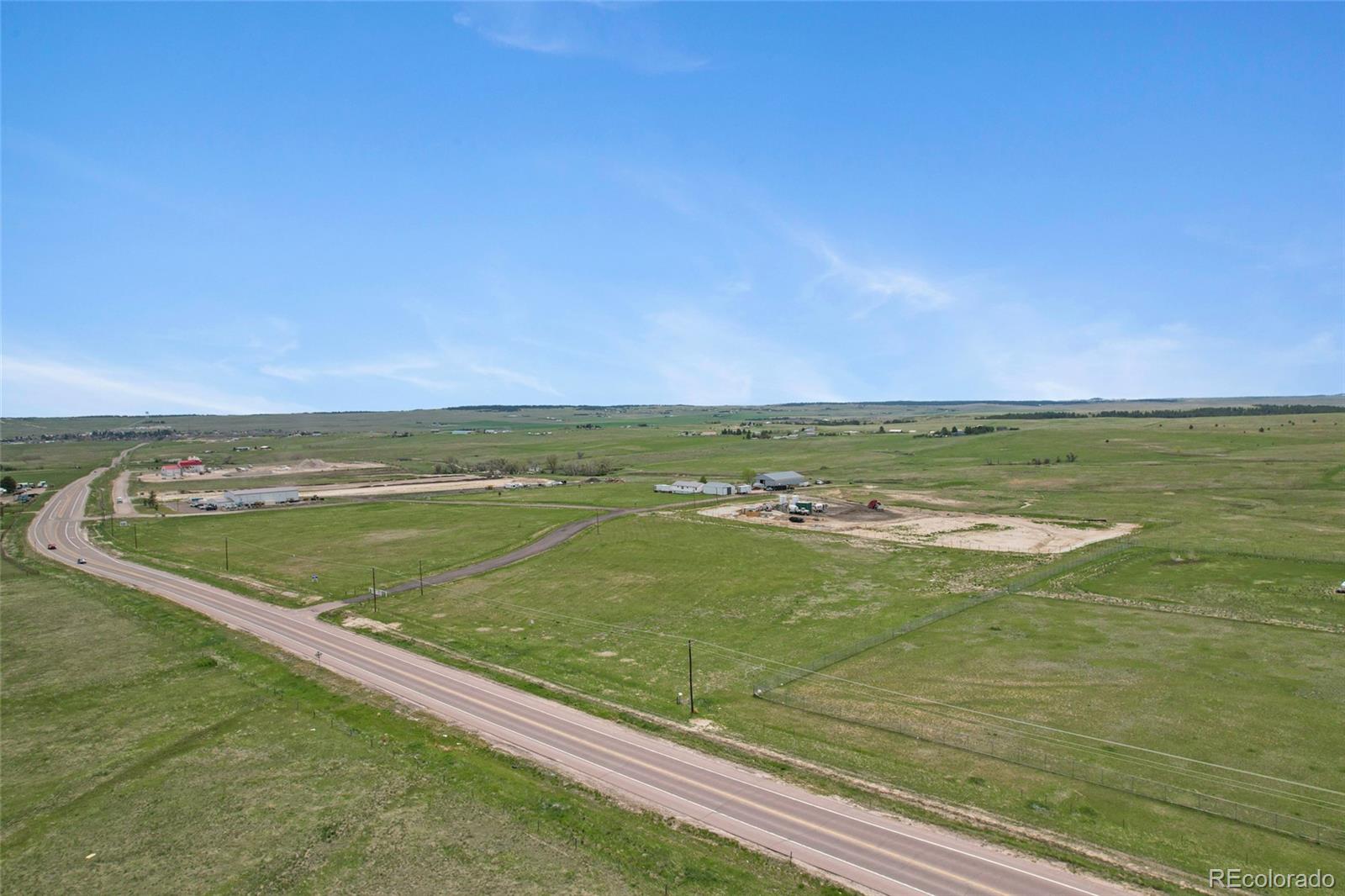 8323 Skill Road Kiowa, CO 80117 - Photo 2 of 2 a view of a lake with a beach