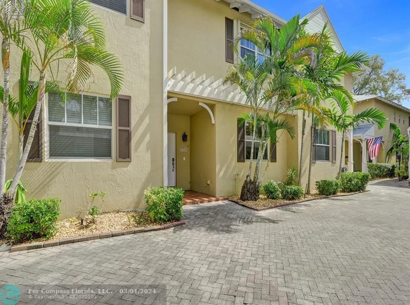 1210 West Las Olas Boulevard Fort Lauderdale, FL 33312 - Photo 1 of 43 a front view of a house with garden