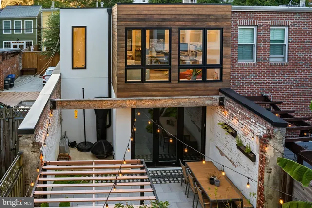 a view of a chairs and table in the patio