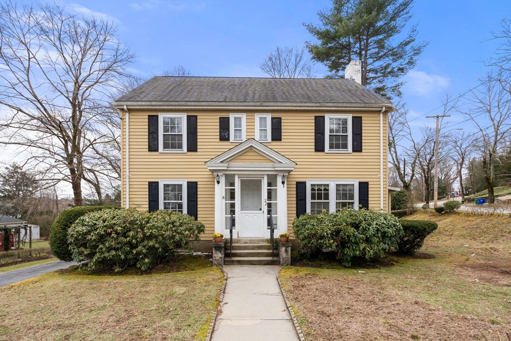22 Arden Road Newton, MA 02460 - Photo 1 of 28 a front view of a house with a garden