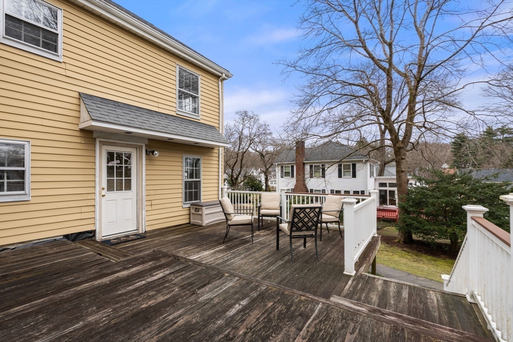 22 Arden Road Newton, MA 02460 - Photo 17 of 28 a view of a house with backyard and sitting area