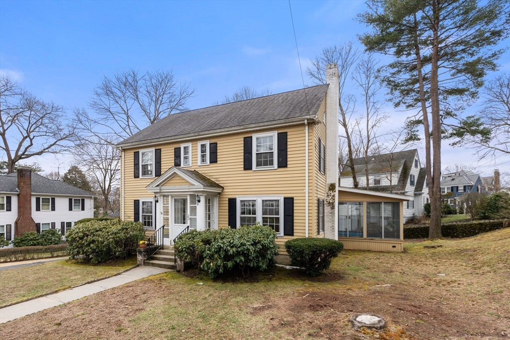 22 Arden Road Newton, MA 02460 - Photo 2 of 28 a front view of a house with a garden