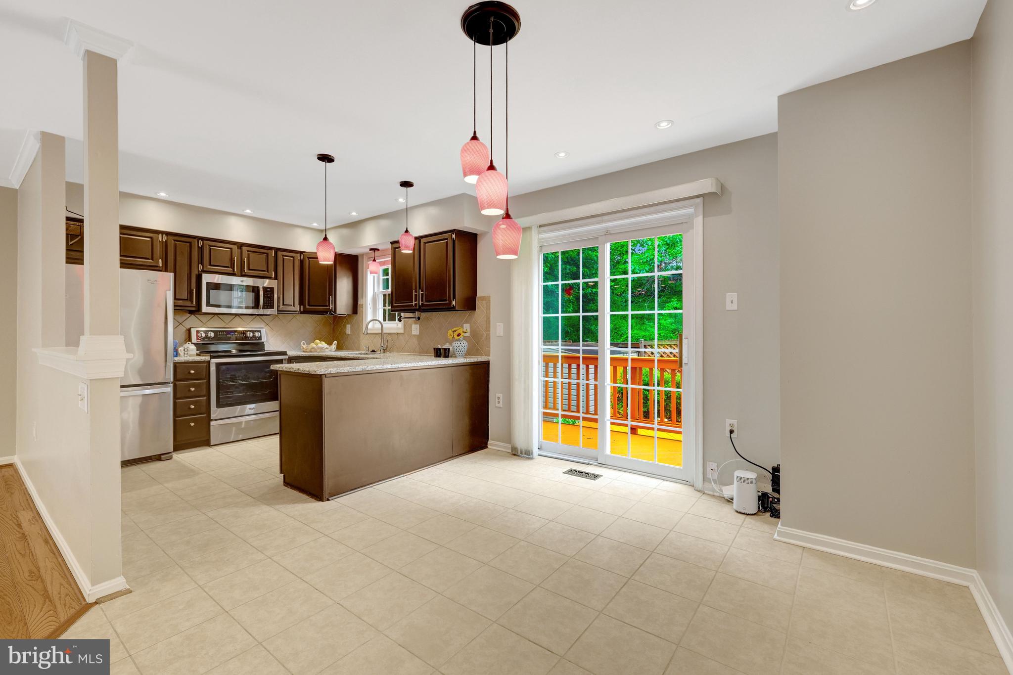 11992 Sentinel Point Court Reston, VA 20191 - Photo 16 of 49 Sliding glass doors leading to back deck