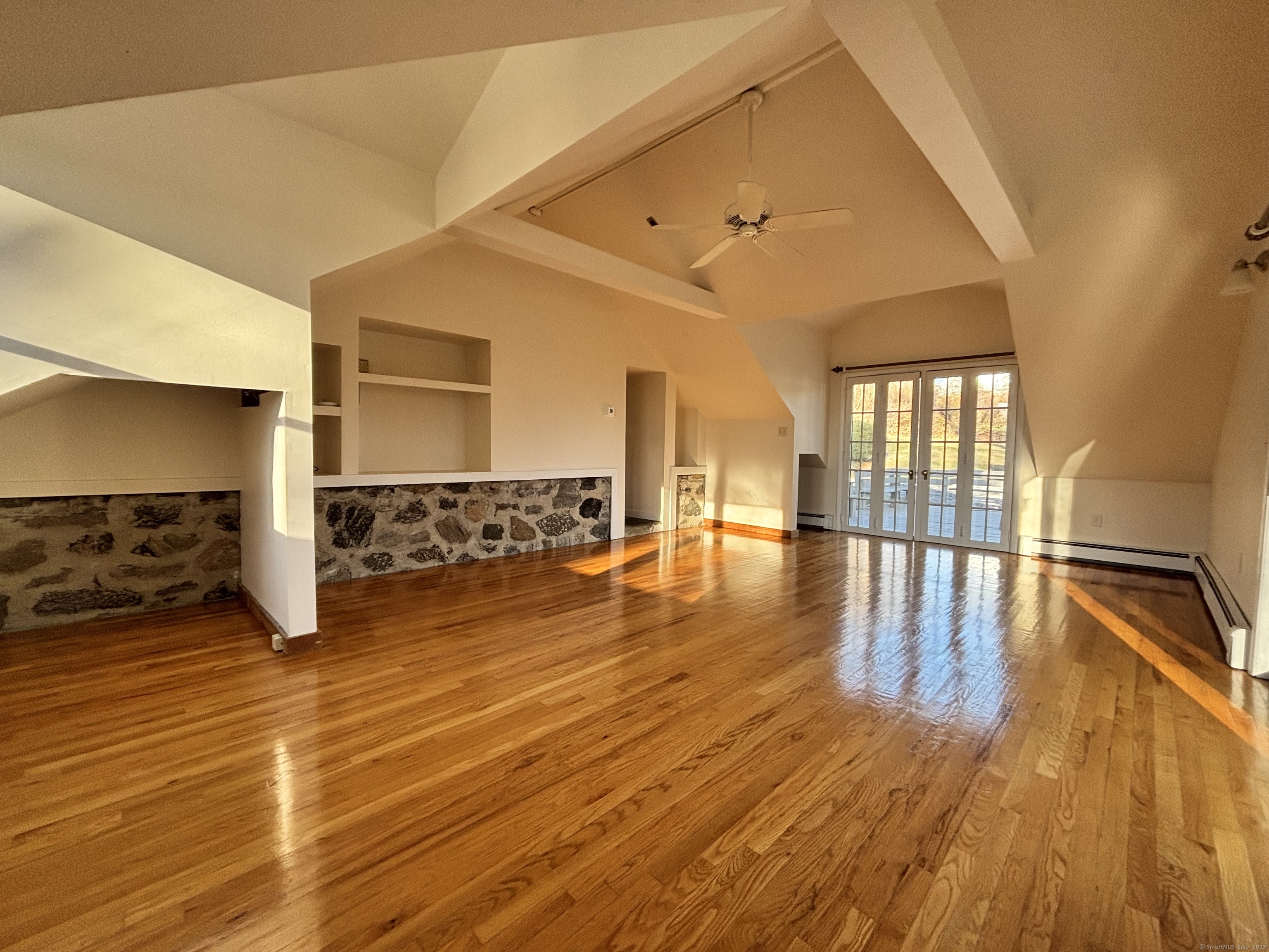 65 B Cross Highway Redding, CT 06896 - Photo 12 of 25 a view of a room with wooden floor