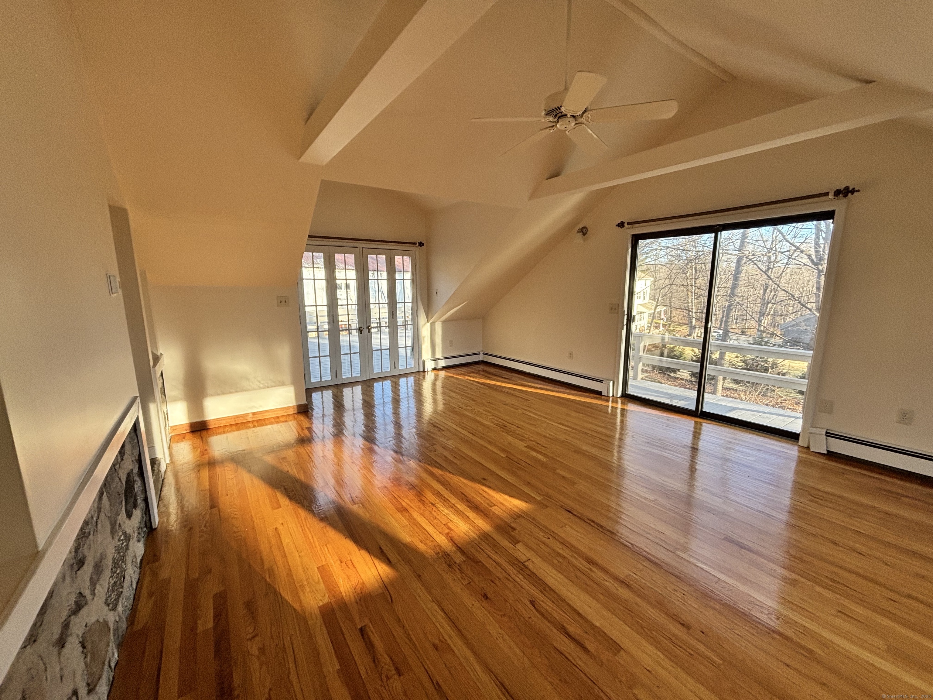 65 B Cross Highway Redding, CT 06896 - Photo 14 of 25 wooden floor in an empty room with a window