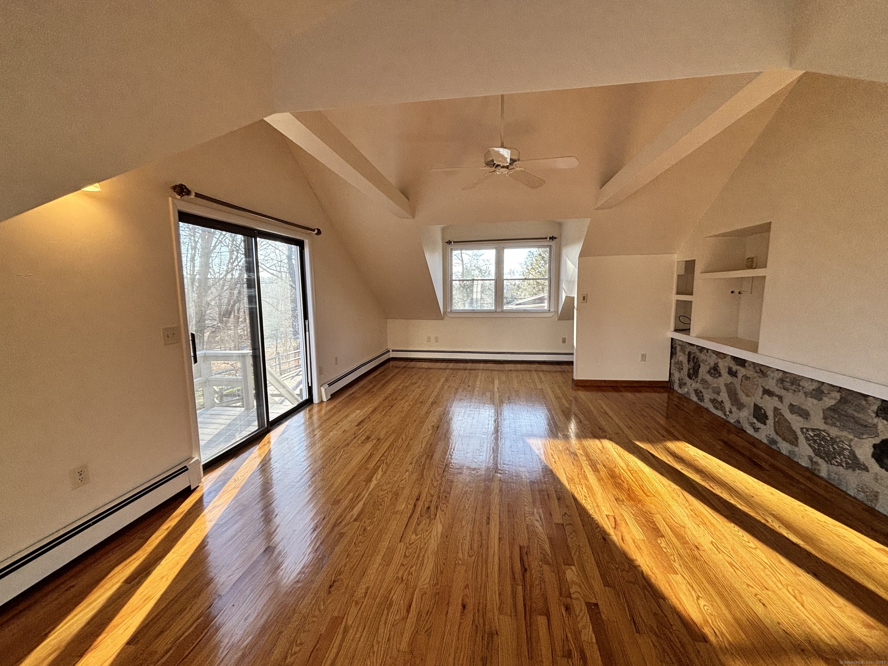 65 B Cross Highway Redding, CT 06896 - Photo 18 of 25 wooden floor in an empty room with a window