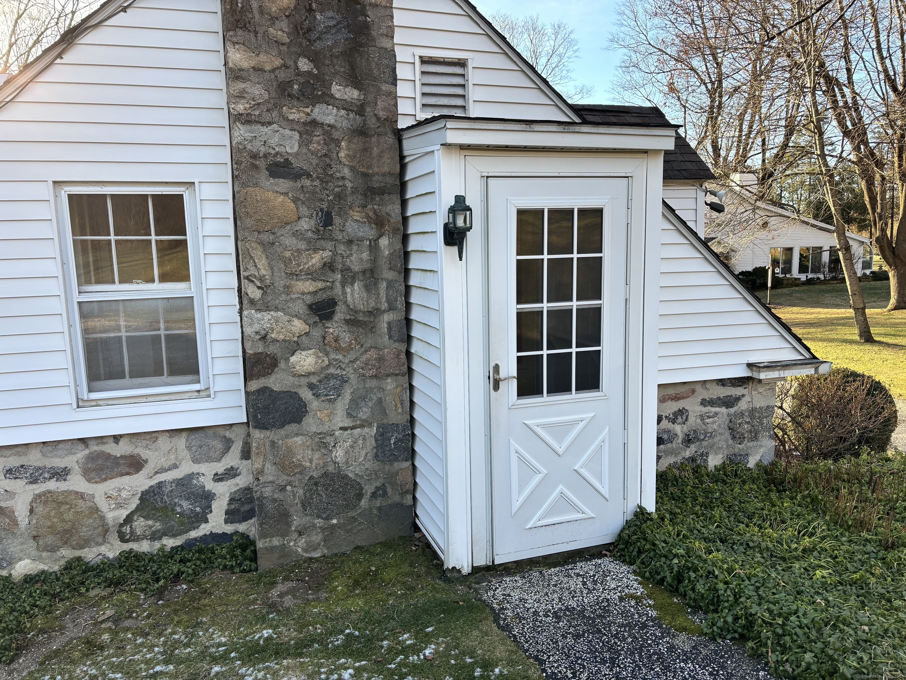 65 B Cross Highway Redding, CT 06896 - Photo 2 of 25 a view of front door of house