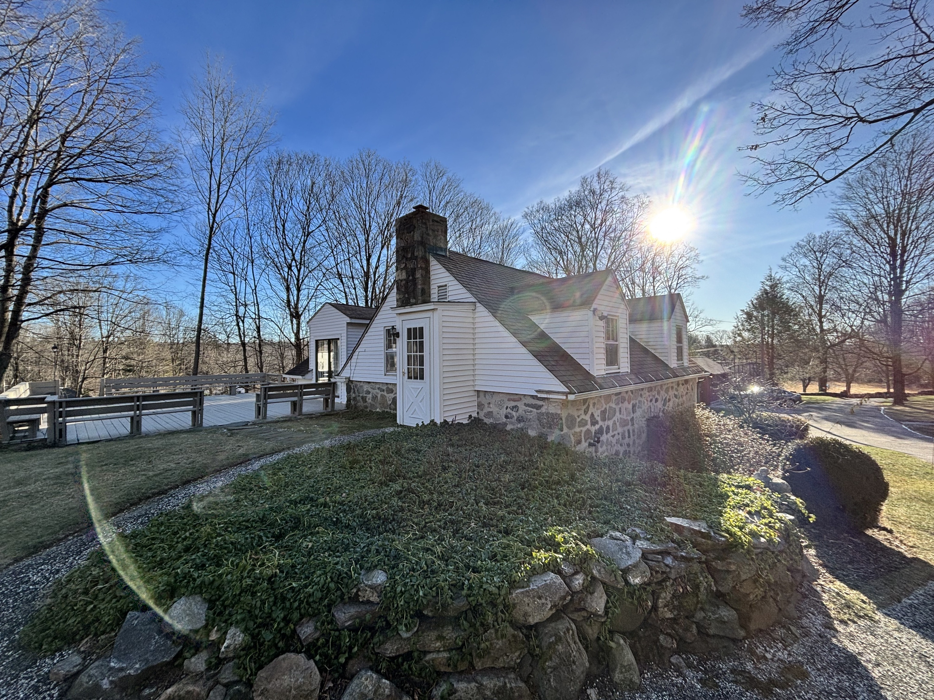 65 B Cross Highway Redding, CT 06896 - Photo 25 of 25 a view of a house with a yard