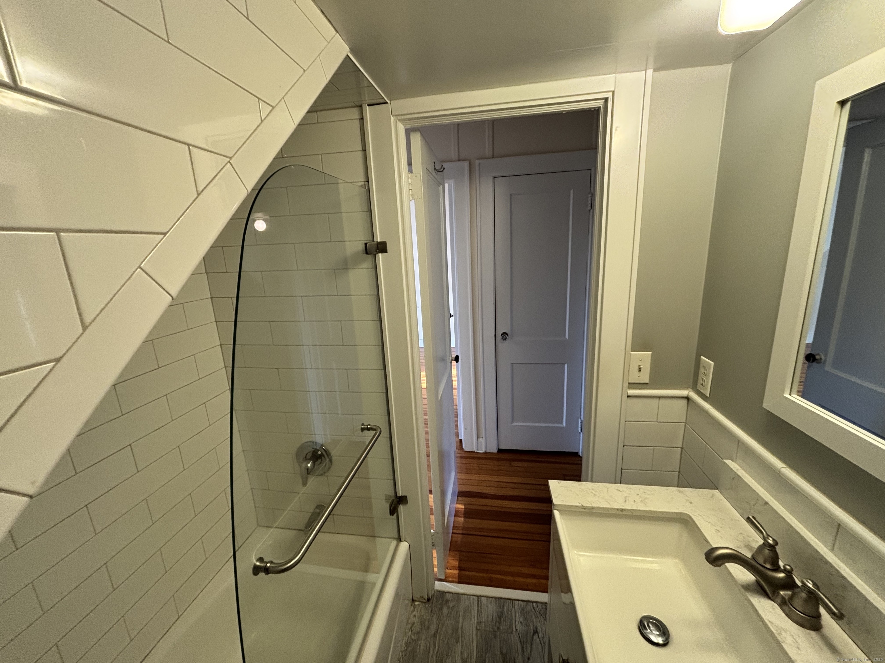 65 B Cross Highway Redding, CT 06896 - Photo 7 of 25 a bathroom with a sink and shower