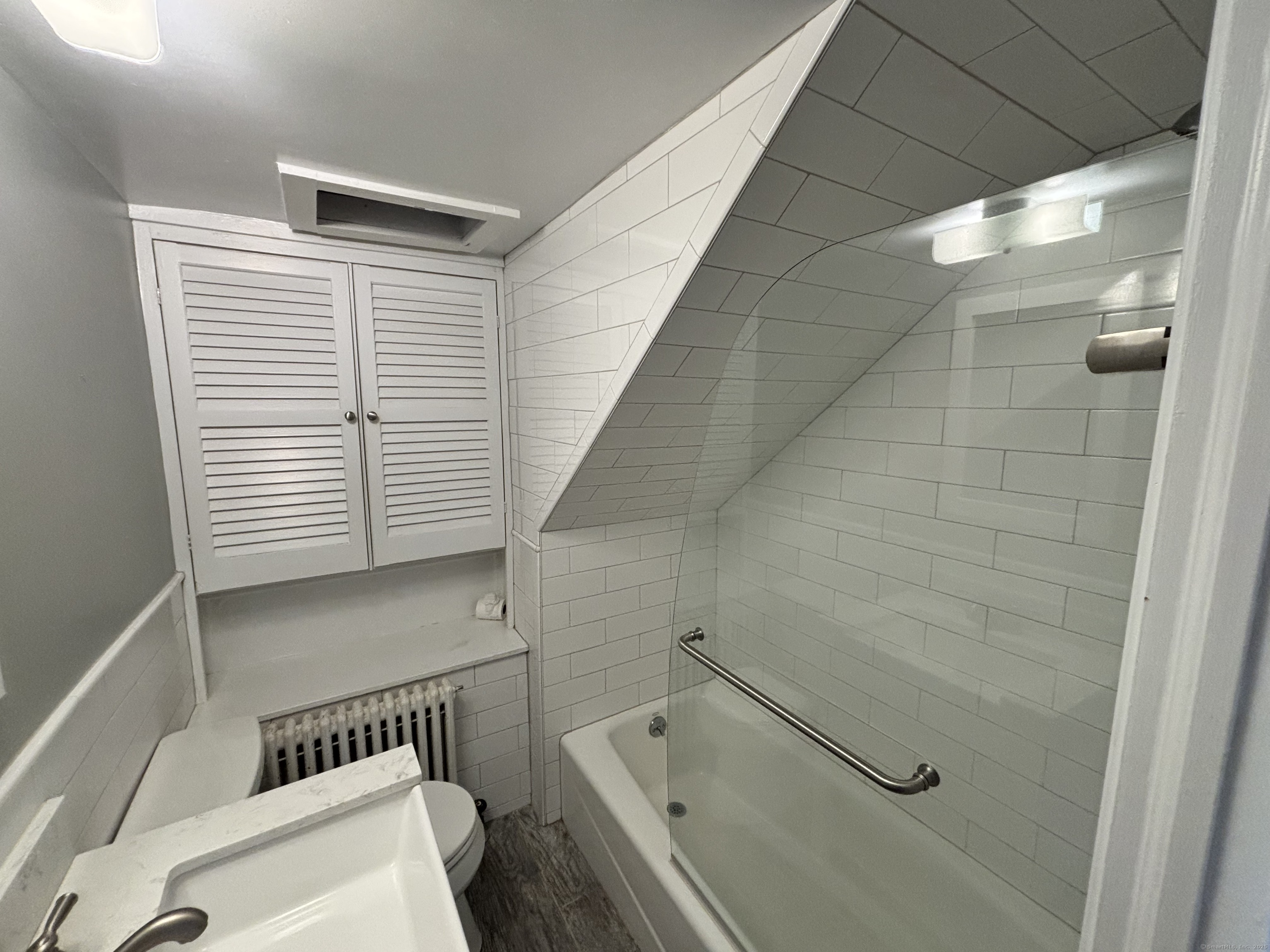 65 B Cross Highway Redding, CT 06896 - Photo 9 of 25 a bathroom with a bathtub and a shower