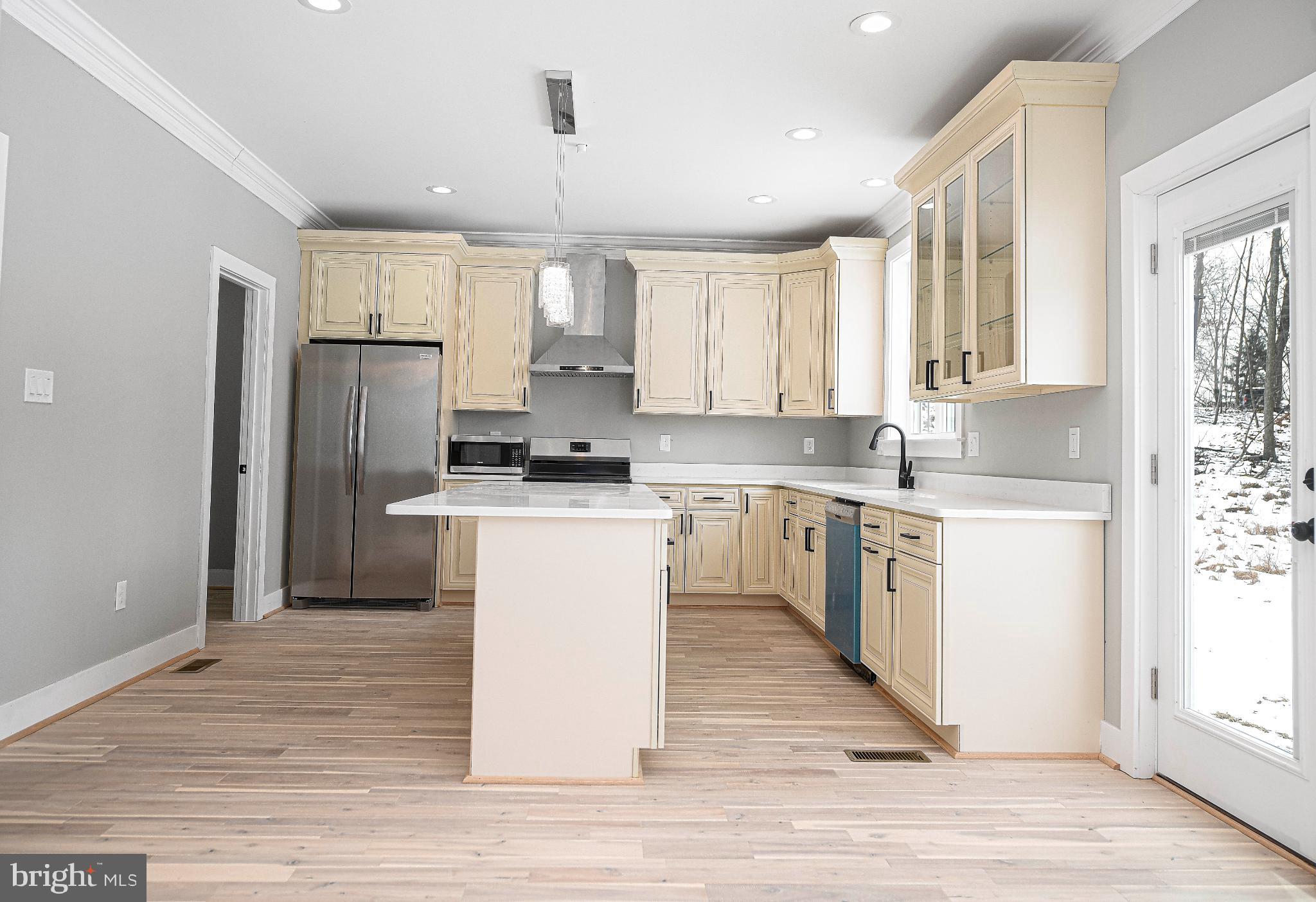 831 Deer Ridge Drive Westminster, MD 21158 - Photo 26 of 61 Bright and airy kitchen with modern finishes.