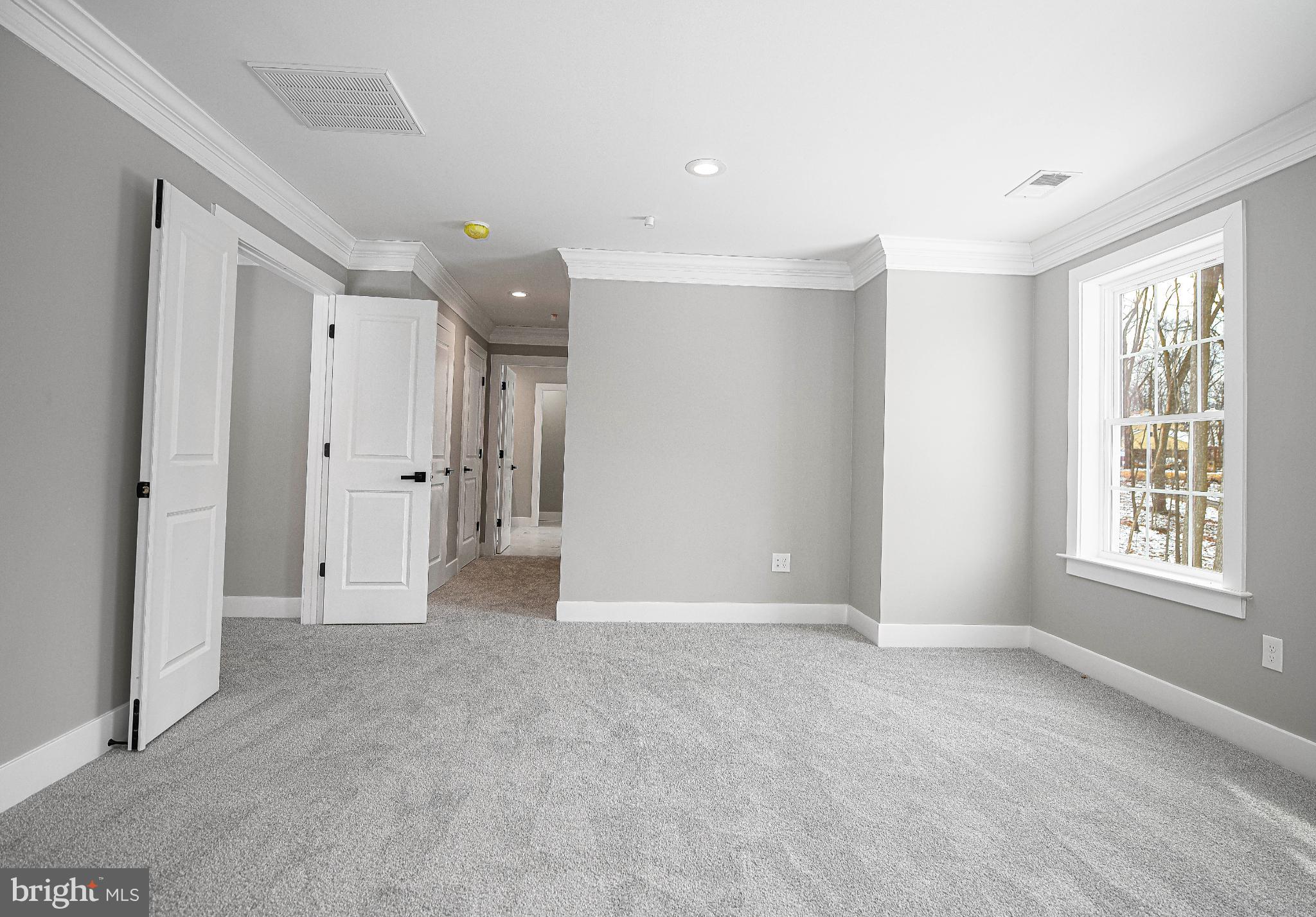 831 Deer Ridge Drive Westminster, MD 21158 - Photo 29 of 61 Spacious room with soft gray tones.