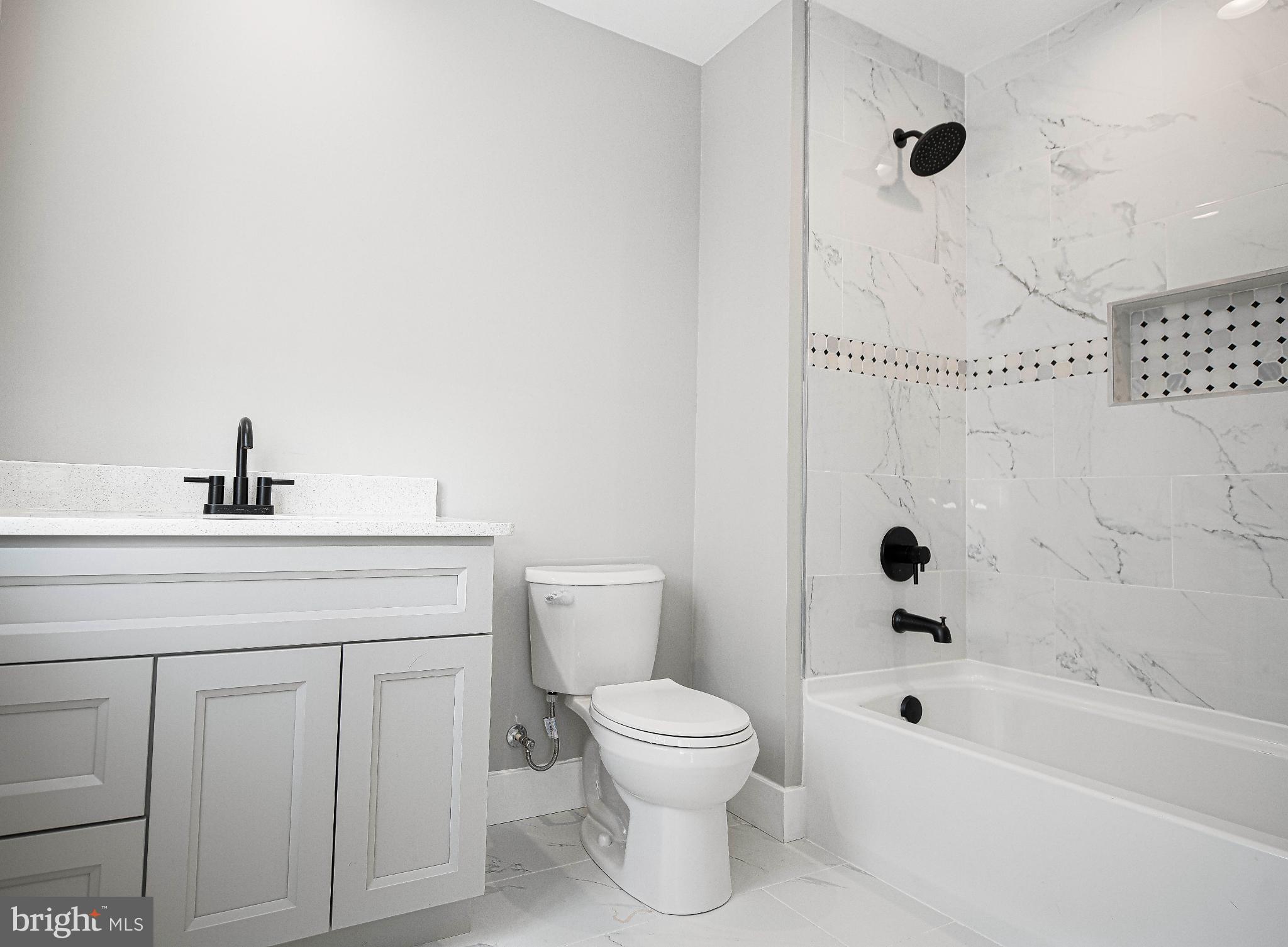831 Deer Ridge Drive Westminster, MD 21158 - Photo 38 of 61 Sleek modern bathroom with elegant finishes.